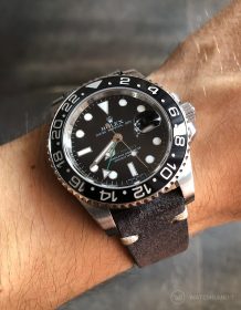 Rolex GMT Master II 116710LN on dark grey suede strap by WatchBandit