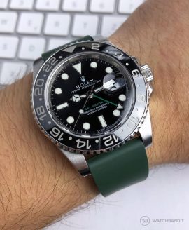 Rolex GMT Master II on green classic Rubber watch strap wrist shot