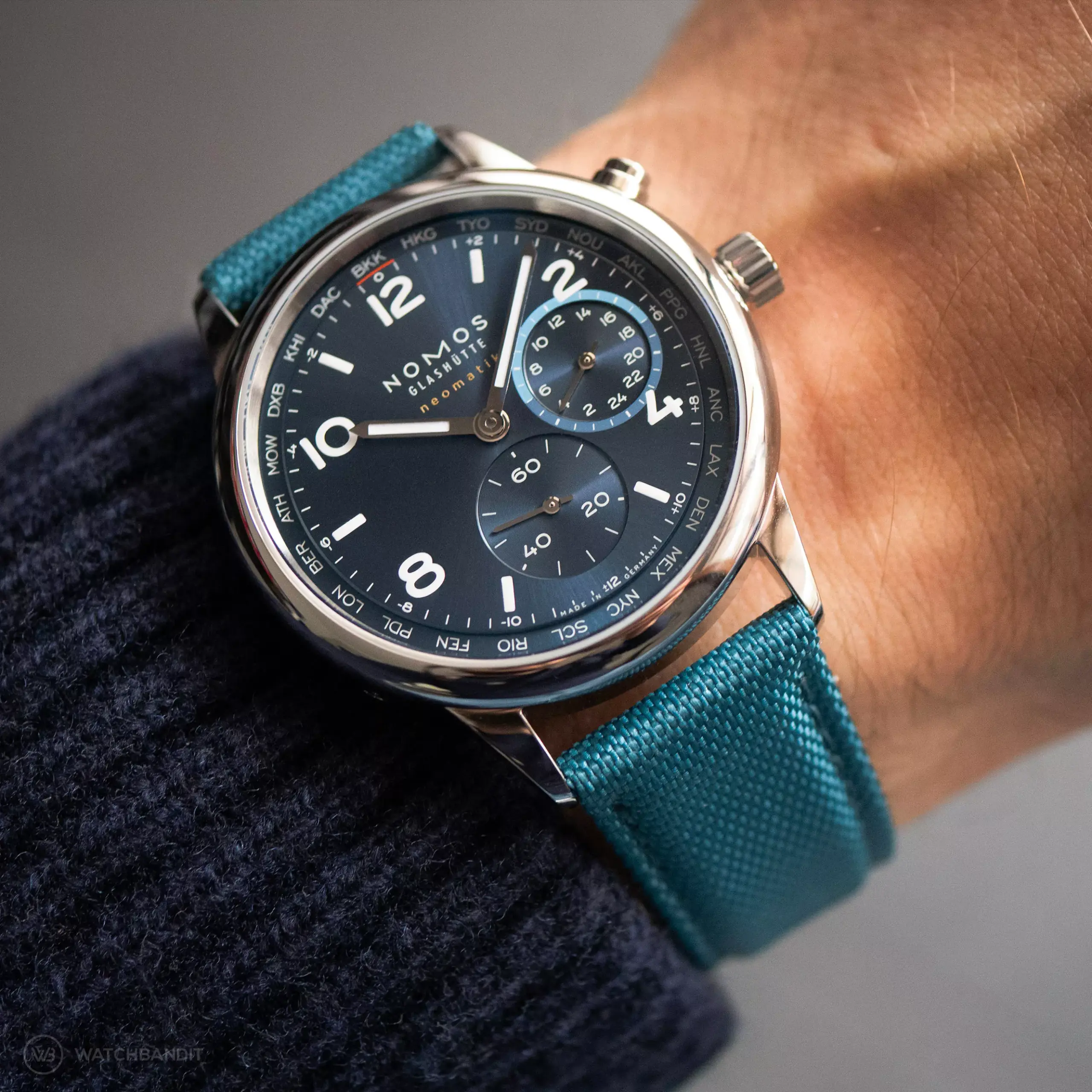 nomos-club-sport-neomatik-worldtimer-strapguide-sailcloth-strap-petrol