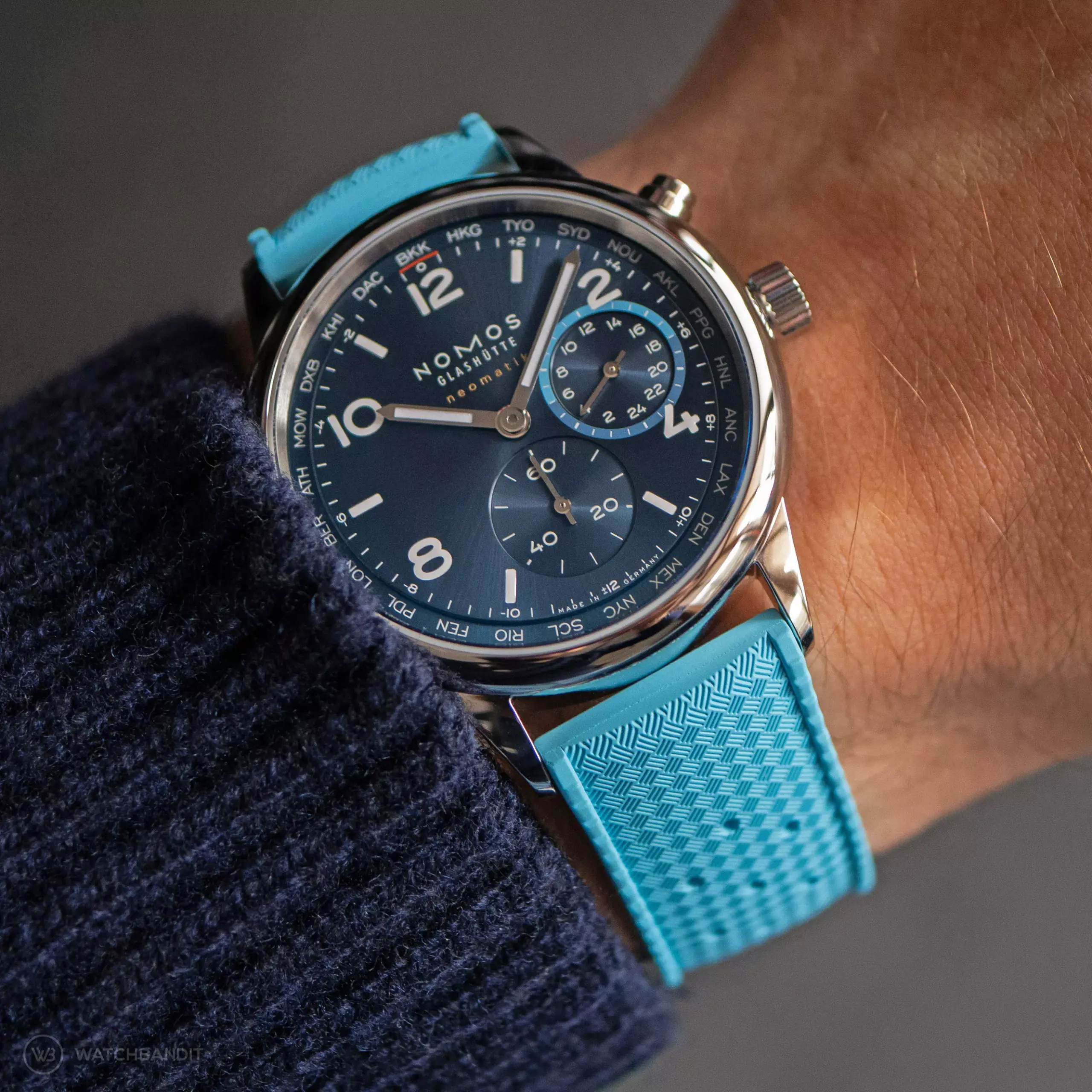 nomos-club-sport-neomatik-worldtimer-strapguide-tropical-rubber-strap-light-blue